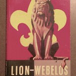 1954 Cub Scout Lion and Webelos Handbook Cover - Fleur De Lis, Carved Wood Lion Statue